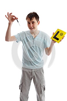 Teenager holding car keys and L plates