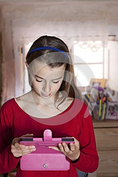 Teenager holding a tablet