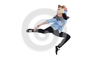 Teenager in jeans dancing street dance