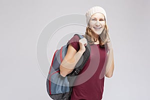 Teenager Lifestyle Ideas. Portrait Of Caucasian Laughing Teenager Girl With Teeth Brackets Posing With Backpack