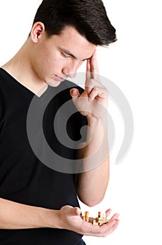 Teenager man concentrated thinking how to solve a bamboozler 3D