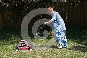 Teenager Mowing the Lawn 6