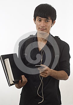 Teenager with music player