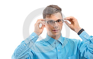 Teenager with new glasses on eyes isolated