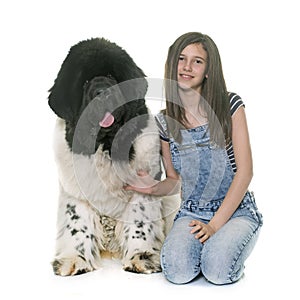 Teenager and newfoundland dog