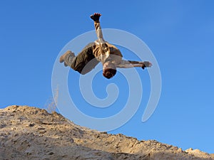 Teenager performs open-arm