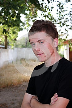 Teenager with pimples on his face portrait photo