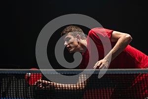 Teenager play table tennis in on white background