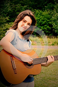 Teenager playing guitar