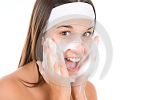 Teenager problem skin care - woman wash face