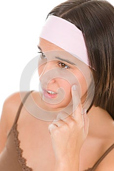 Teenager problem skin care - young woman