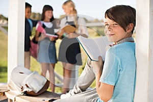 Teenager reading book