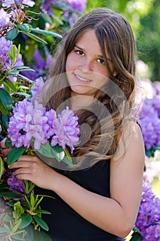 Teenager with rhododendron