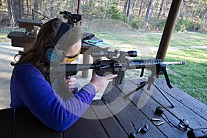 Teenager at shooting range photo