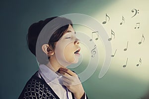 Teenager singer boy sing close up portrait