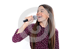 Teenager singing with a microphone. Karaoke singer. Teen girl sings. Child girl musician loud voice. Portrait of happy