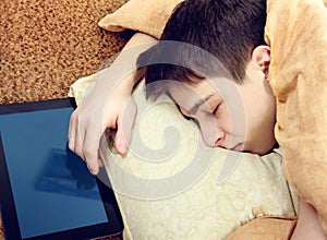 Teenager sleep with Tablet