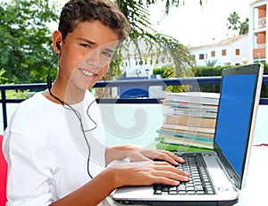 Teenager student happy boy laptop earphones photo