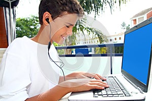 Teenager student happy boy laptop earphones