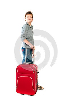 Teenager with a suitcase. Isolation on the white