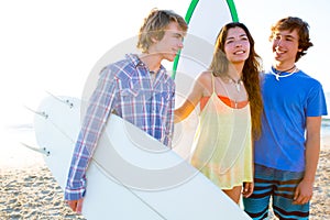 Teenager surfers group happy in beach shore