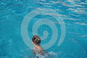 Teenager in swimming pool