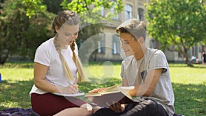 Teenager trying to kiss woman, indifferent to relationship, disappointment