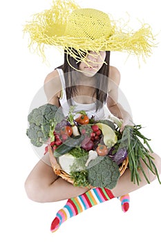Teenager with vegetable