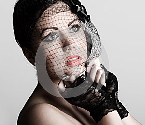 Teenager in Veil and Lace Gloves
