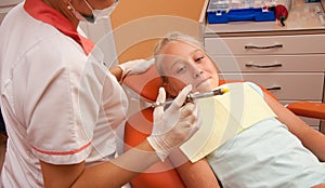 Teenager visiting dentist