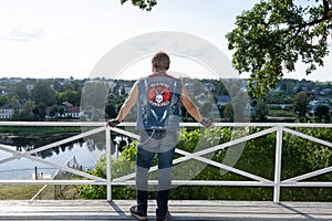 A teenager walks in the park of `Love and Fidelity`. Beautiful landscape. Historically restored park, in the style of the 19th cen