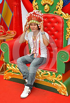 Teenager Wearing Chinese Headdress