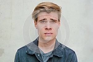 Teenager young man portrait model dissatisfied