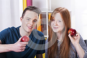 Teenagers with apples