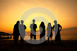 Teenagers on the beach photo