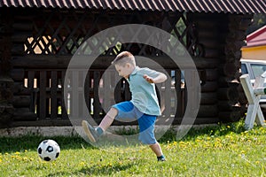 Teenagers Boys Playing Soccer Football Match. Young Football Players Running and Kicking Soccer Ball on a Soccer Pitch.