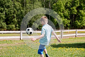 Teenagers Boys Playing Soccer Football Match. Young Football Players Running and Kicking Soccer Ball on a Soccer Pitch.