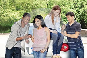 Teenagers with car