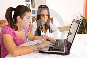 Teenagers with computer
