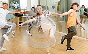 Teenagers dancing swing in studio