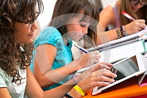 Teenagers doing schoolwork.