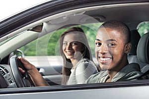 Teenagers driving car