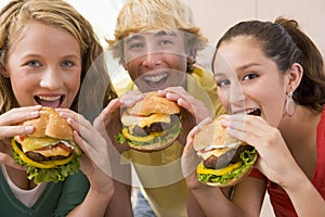 Teenagers Eating Burgers