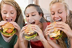 Teenagers Eating Burgers