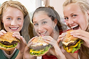 Teenagers Eating Burgers
