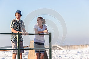 Teenagers Girl Boy Talking Tidal Pool Ocean Waves