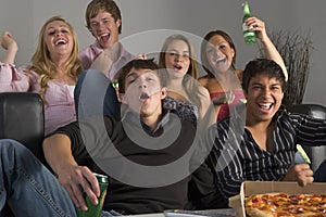 Teenagers Having Fun And Eating Pizza photo