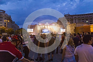 Teenagers having a good time at an outdoor festival