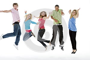 Teenagers Jumping In The Air