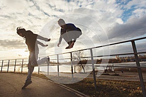 Teenagers jumping parkour motivation